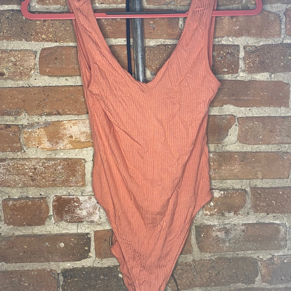 Out From Under Salmon Colored Bodysuit